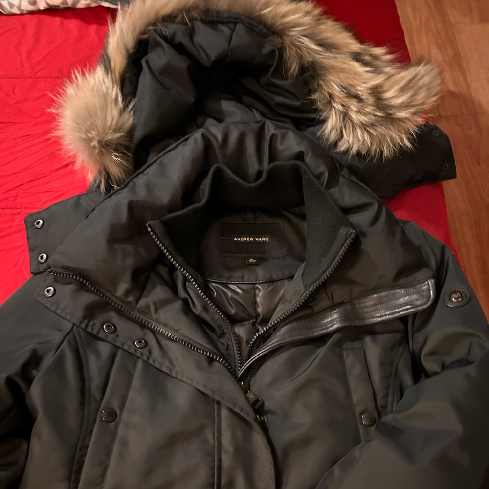 Women’s black Andrew Marc down coat in great condition! Worn twice only !